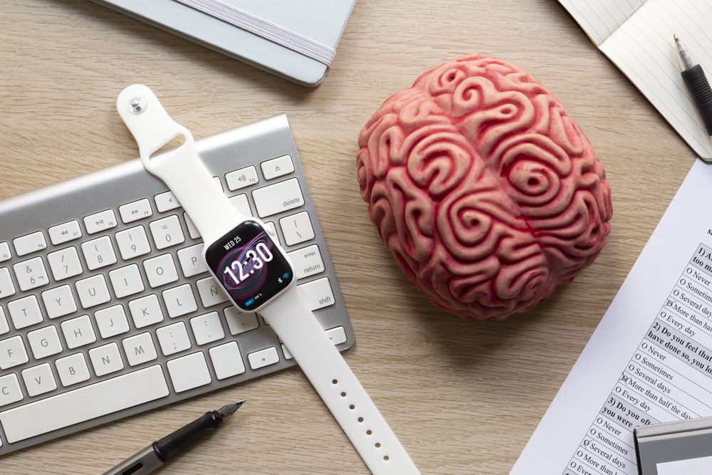 A person working with full focus at a clean desk, blocking distractions